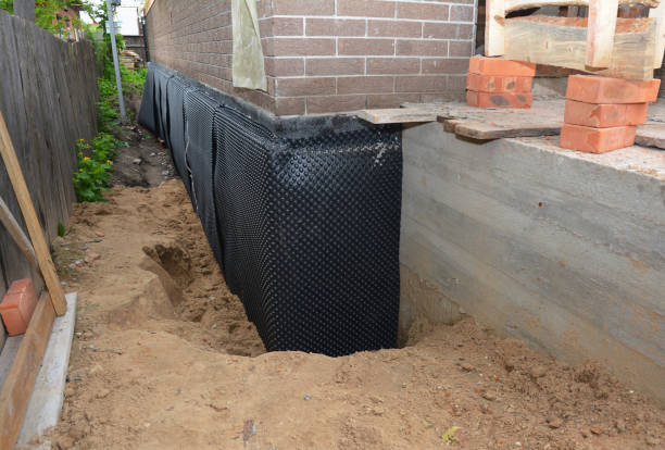 Happy homeowners after waterproofing job in Convent Station